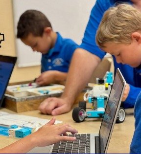 Capstone Robotics Students Capstone Academy middle school students building and programming robots
